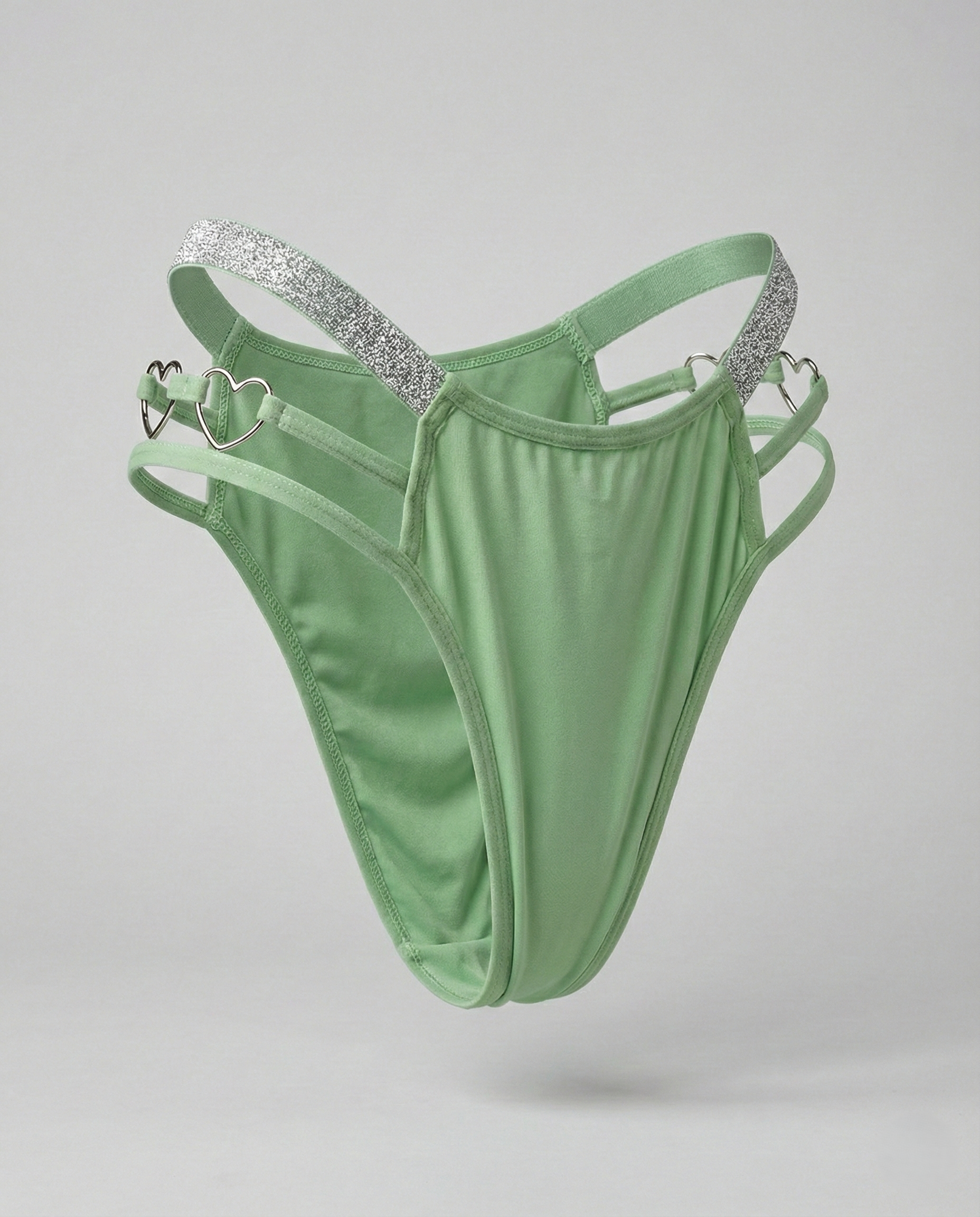 Heart-shaped plus size thong with romantic embroidery showcasing playful seduction and comfortable fit