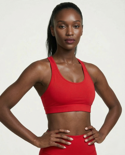 Athletic woman wearing black Active Comfort Sports Bra with racerback and smooth stretch fabric during workout