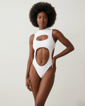 Black bandage one-piece swimsuit with hollow-out sleek design on model at the beach