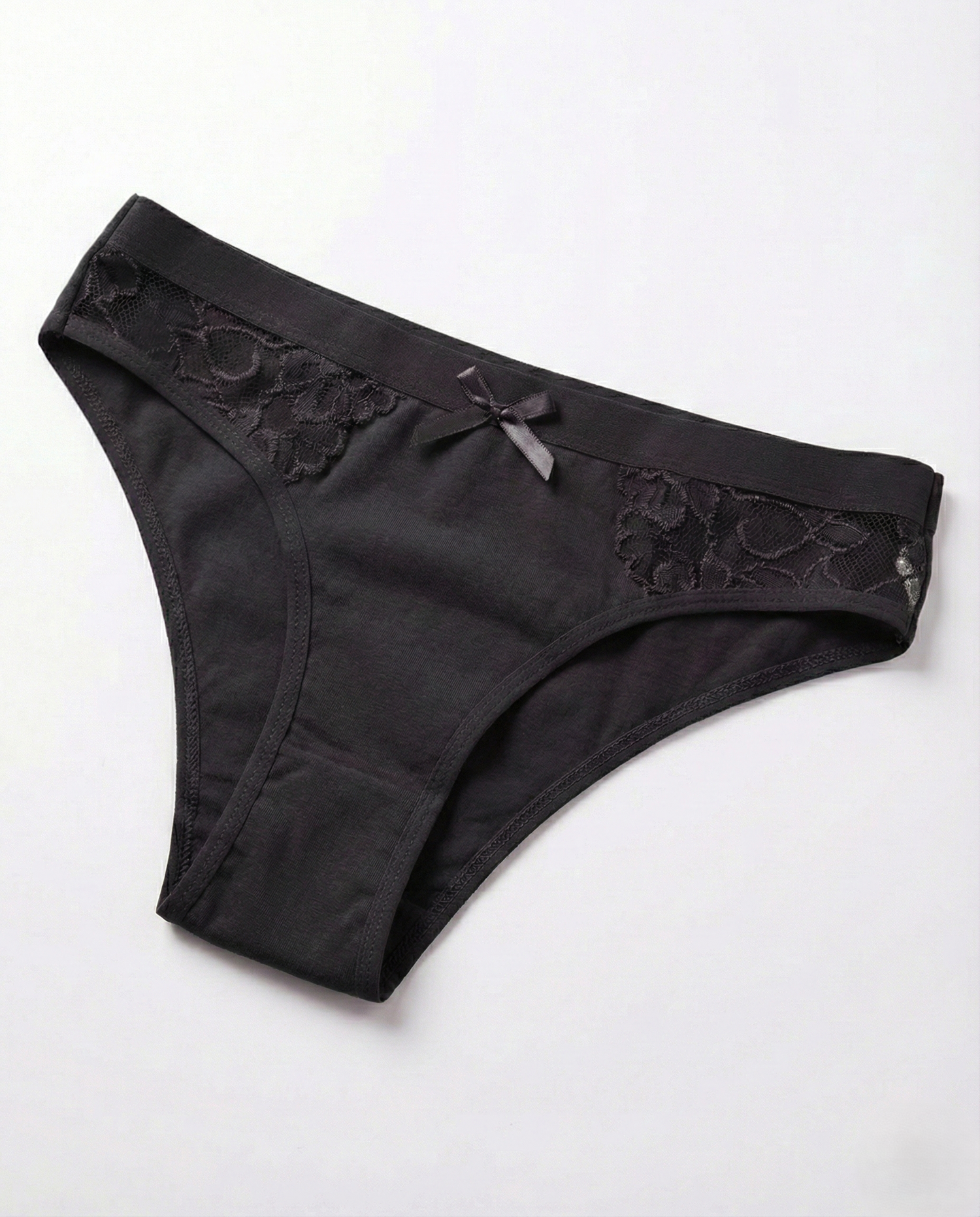 Low-rise cotton sexy panties with lace trim and bow detail for natural comfort and confident curves