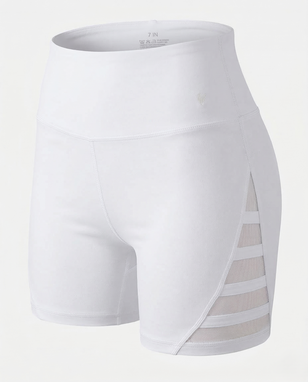 Peach-colored curve-enhancing yoga pants with mid-rise waistband and contouring fit for lifting and shaping curves