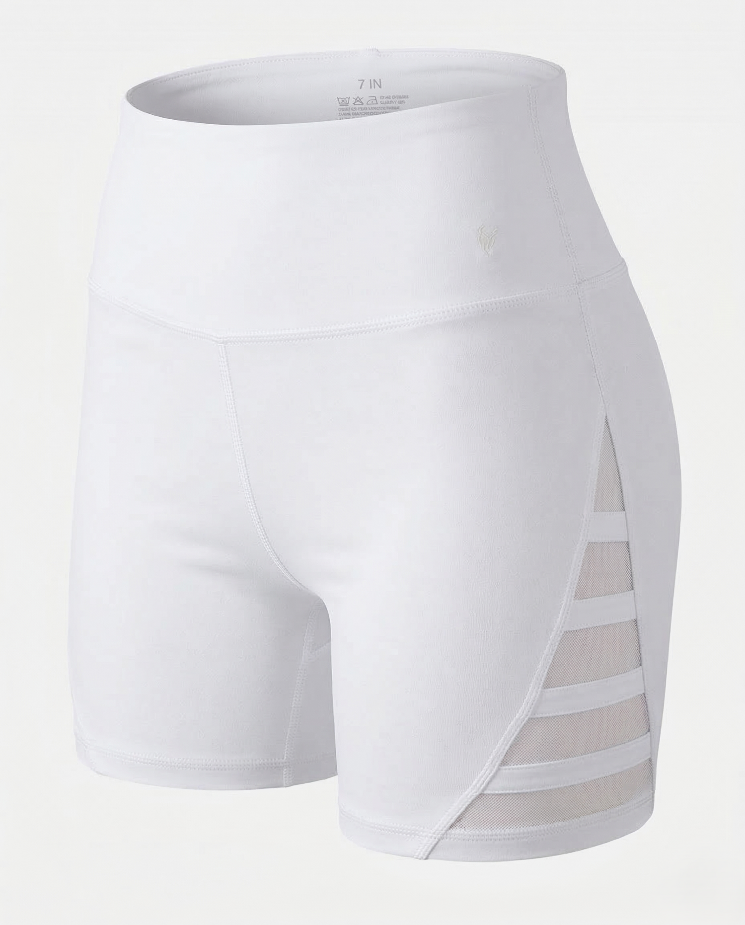 Peach-colored curve-enhancing yoga pants with mid-rise waistband and contouring fit for lifting and shaping curves