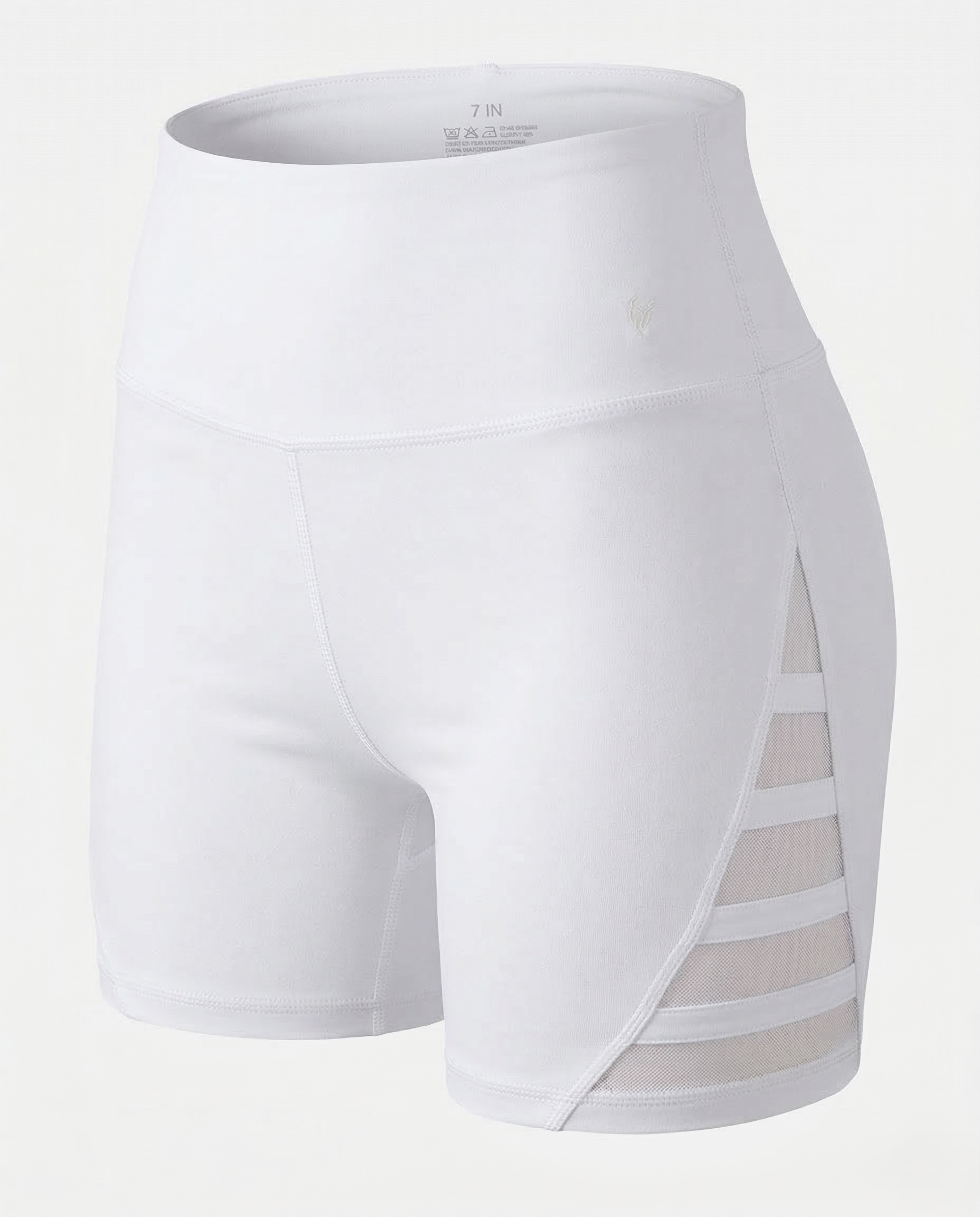 Peach-colored curve-enhancing yoga pants with mid-rise waistband and contouring fit for lifting and shaping curves