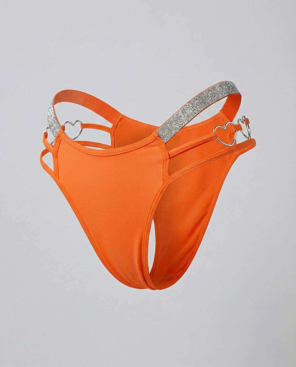 Heart-shaped plus size thong with embroidered waist detail and mid-rise fit for comfortable, flattering wear