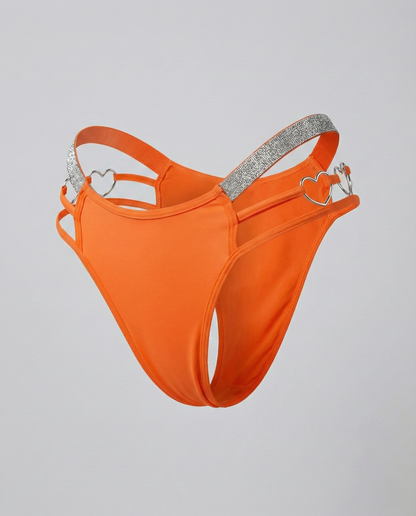 Heart-shaped plus size thong with embroidered waist detail and mid-rise fit for comfortable, flattering wear
