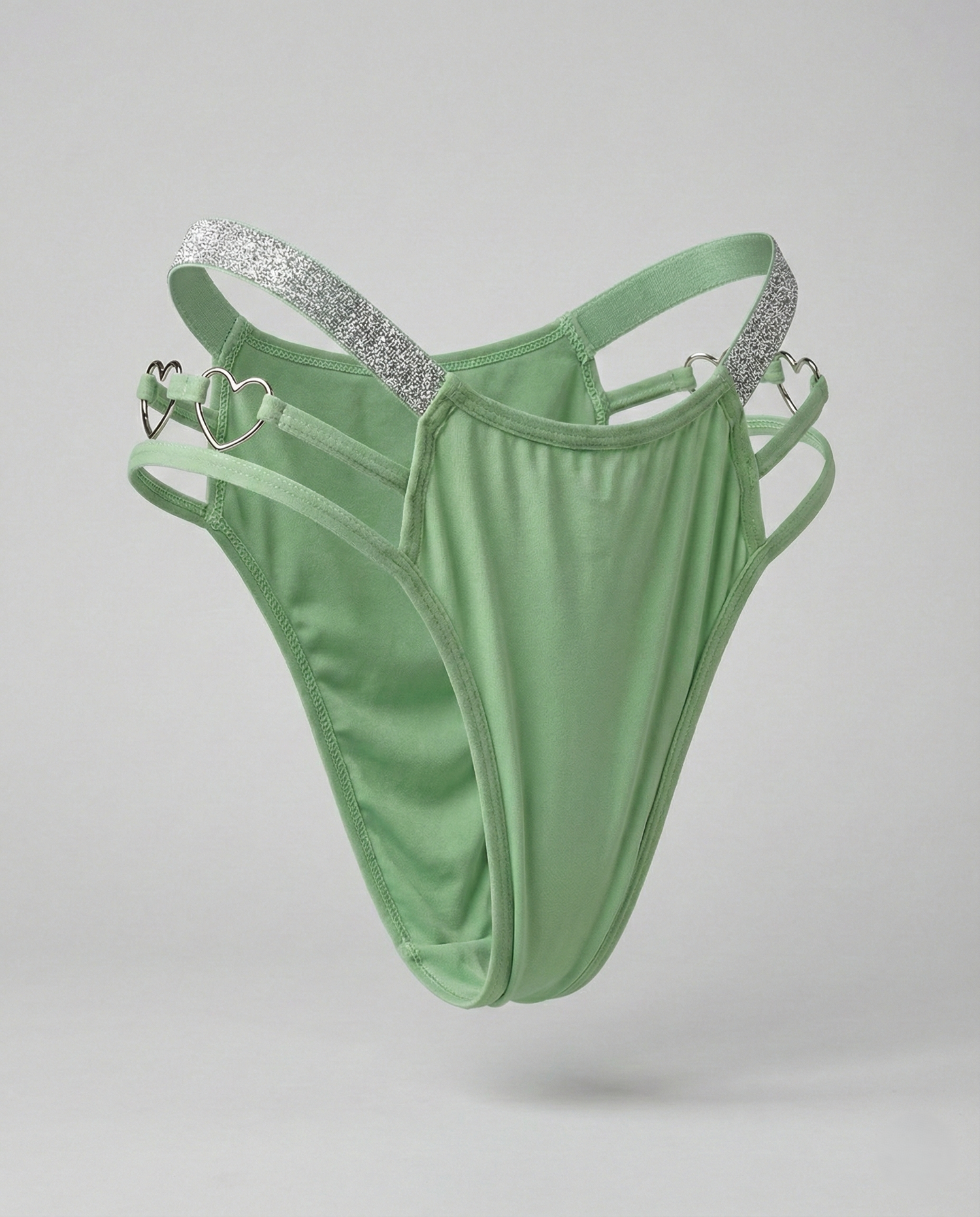 Heart-shaped plus size thong with romantic embroidery showcasing playful seduction and comfortable fit