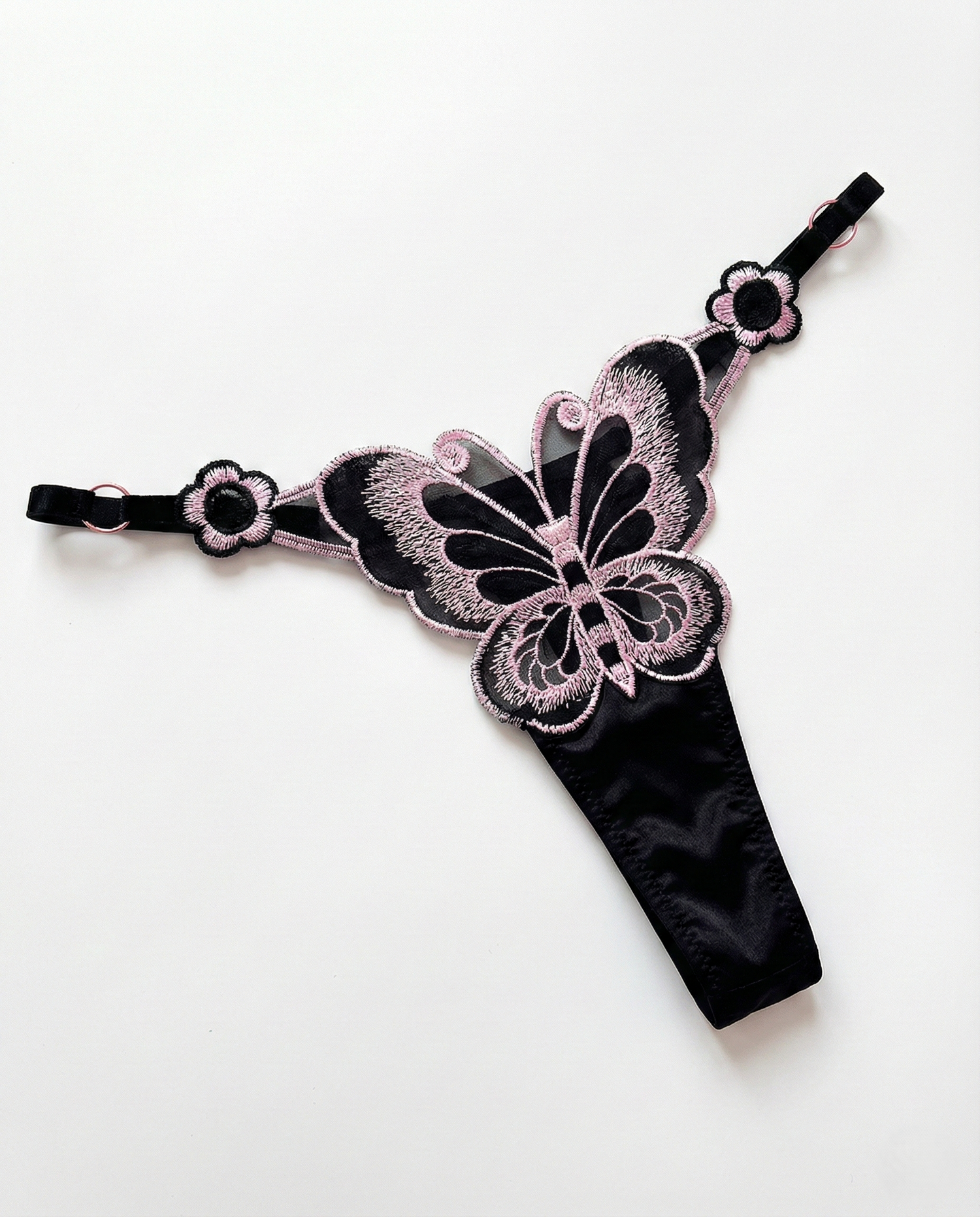 Minimal coverage lace sheer thong with embroidered pearl accents and smooth waistband