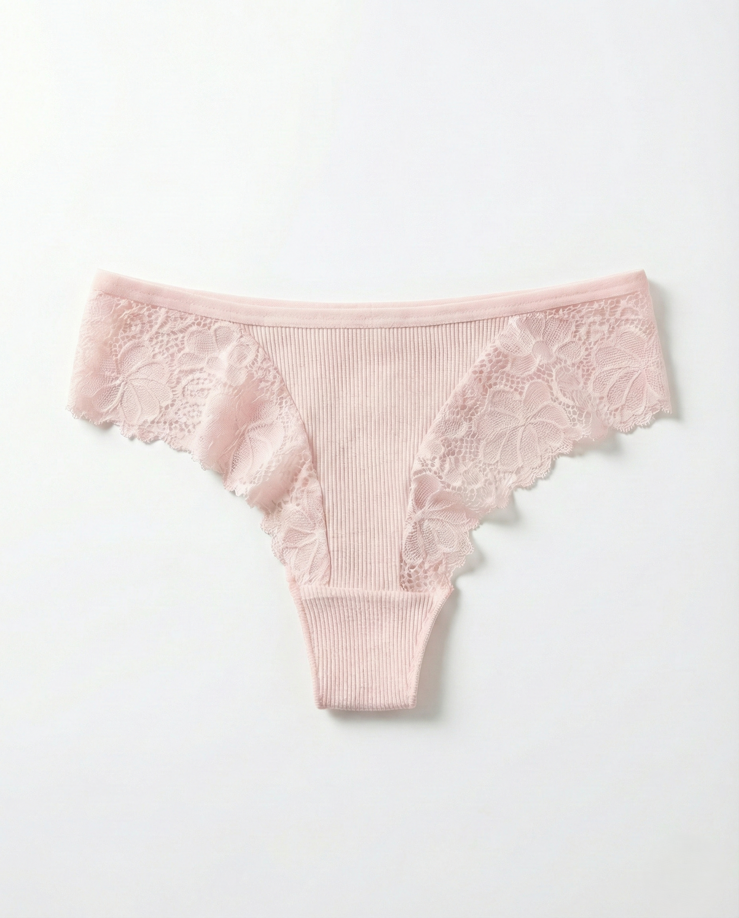 Women’s Romantic Lace Thong in lightweight breathable cotton blend with delicate lace trim and minimal back coverage.