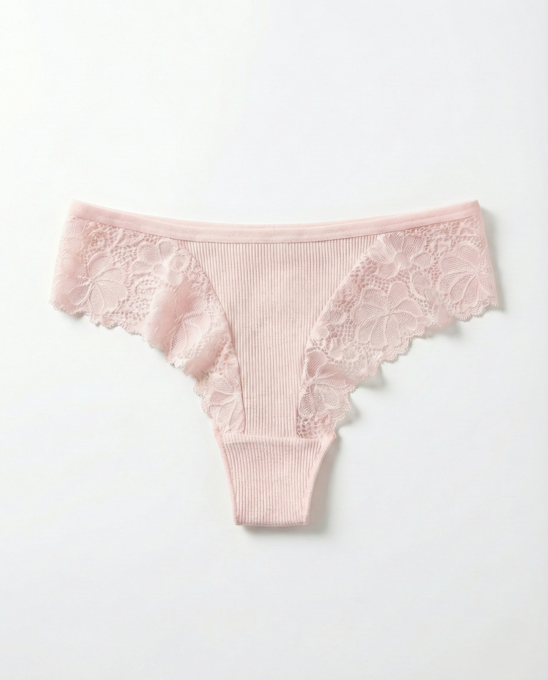 Women’s Romantic Lace Thong in lightweight breathable cotton blend with delicate lace trim and minimal back coverage.