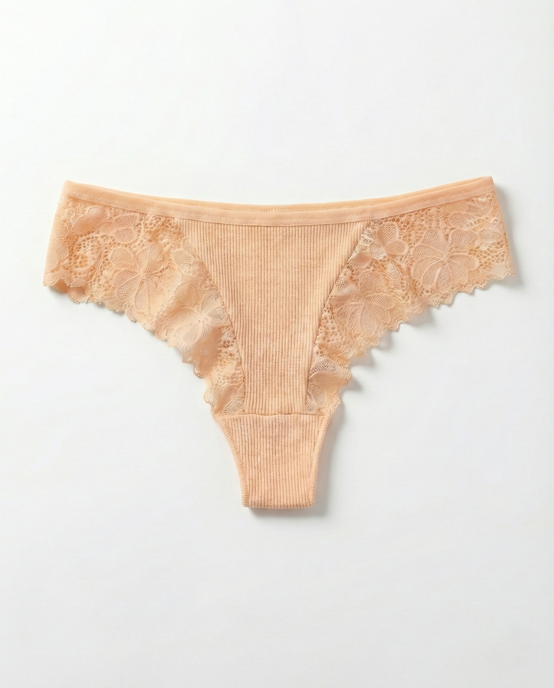 Romantic Lace Thong in delicate lace with breathable, lightweight fabric and flattering mid-rise fit for women