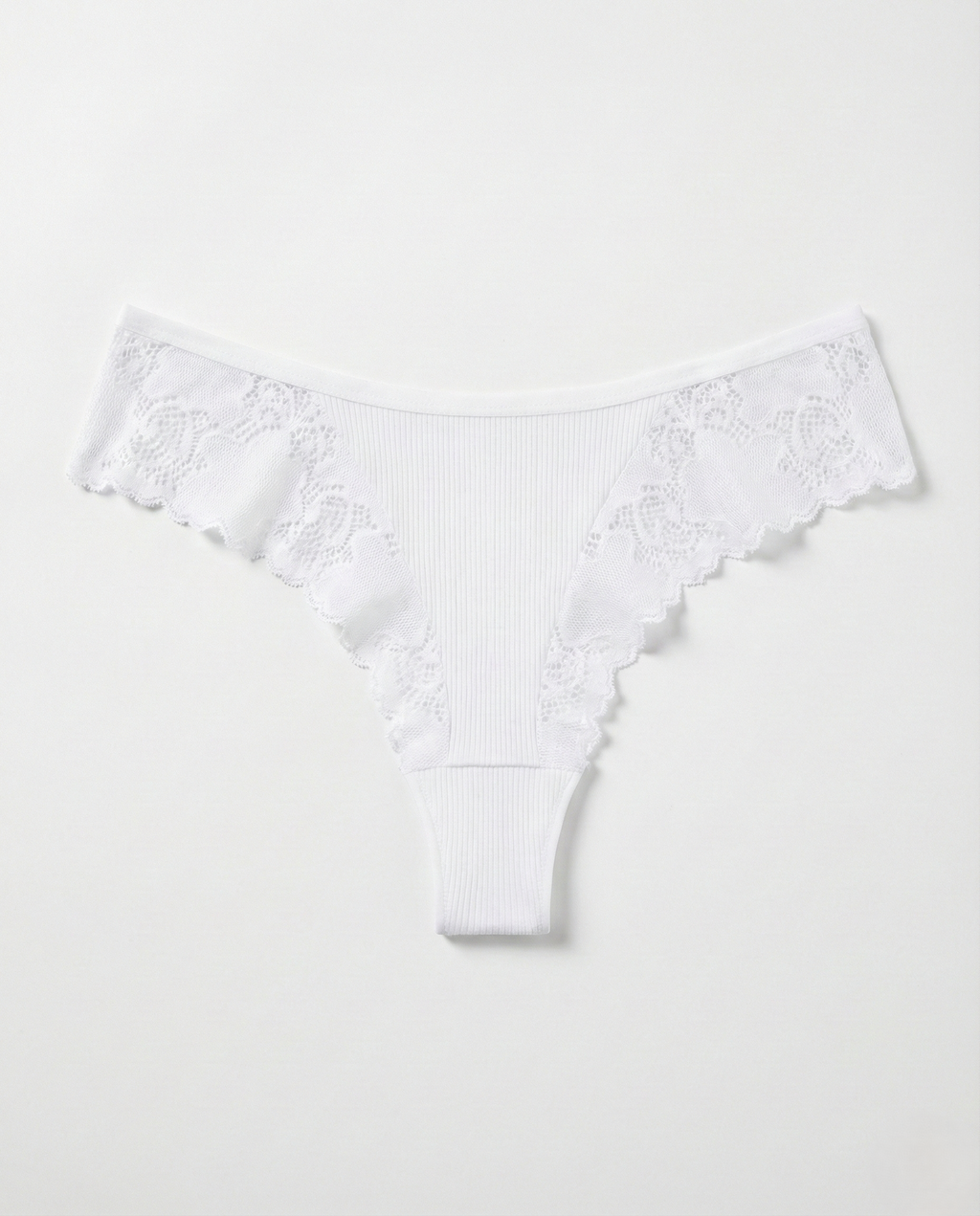 Romantic Lace Thong in delicate lace with lightweight, breathable fabric and flattering minimal back coverage for women