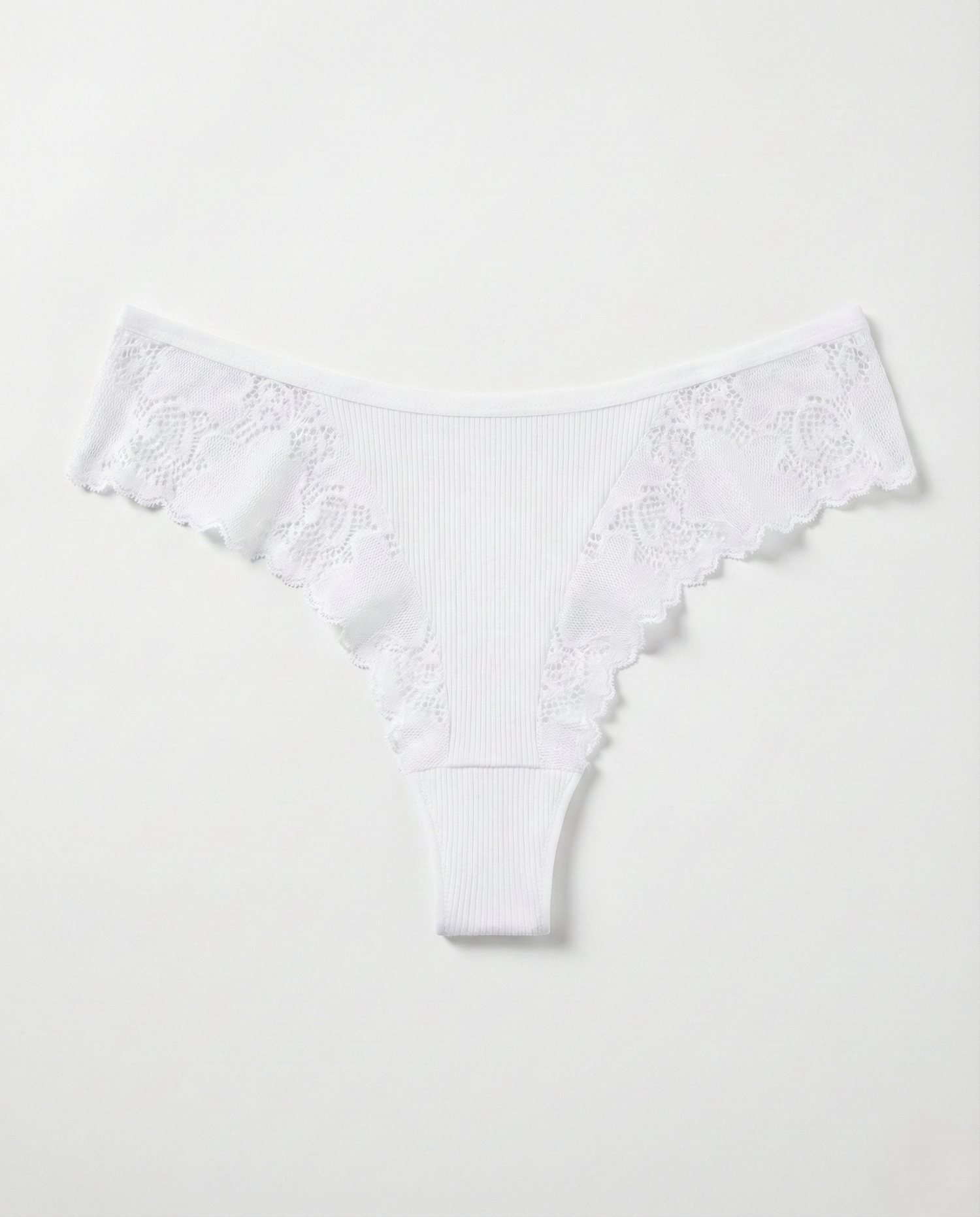 Romantic Lace Thong in delicate lace with lightweight, breathable fabric and flattering minimal back coverage for women