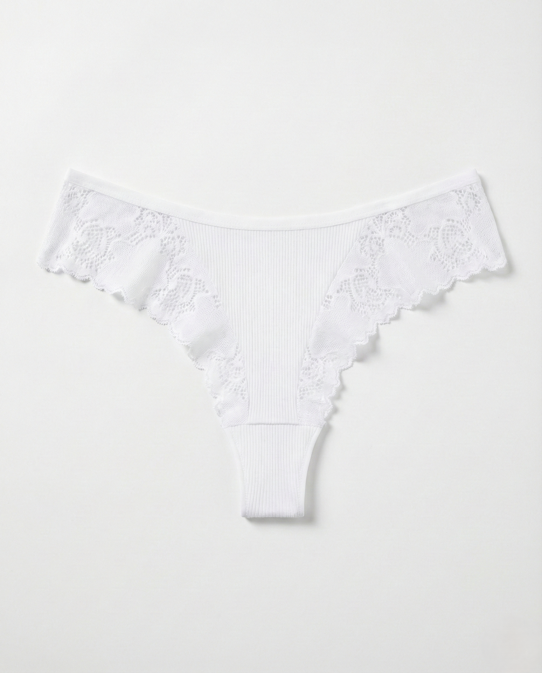 Romantic Lace Thong in delicate lace with lightweight, breathable fabric and flattering minimal back coverage for women