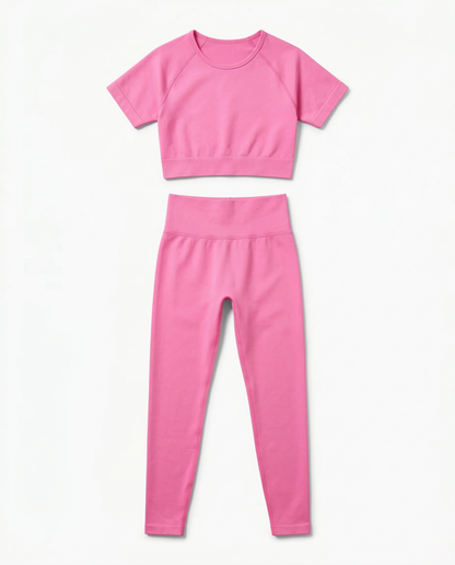 Women wearing sleek seamless fitness set with short sleeve top and stretch pants in vibrant color