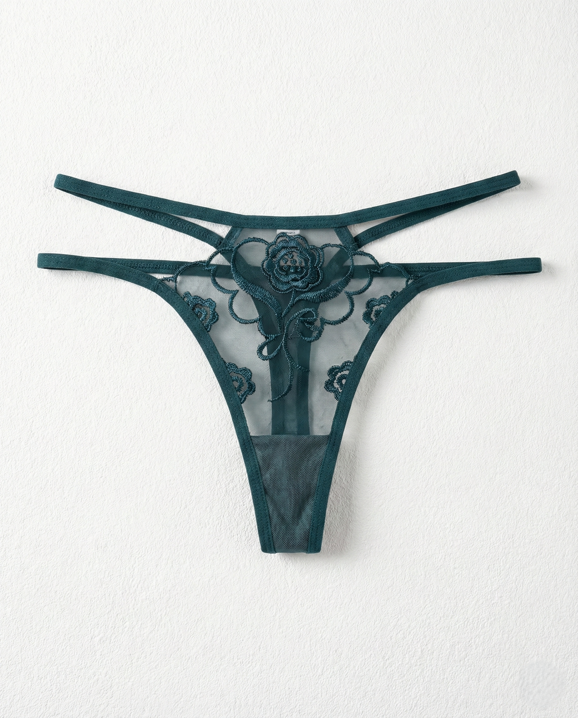 Sheer lace embroidered thong with delicate animal-inspired lace and sheer mesh, perfect for enhancing curves and seamless under clothing