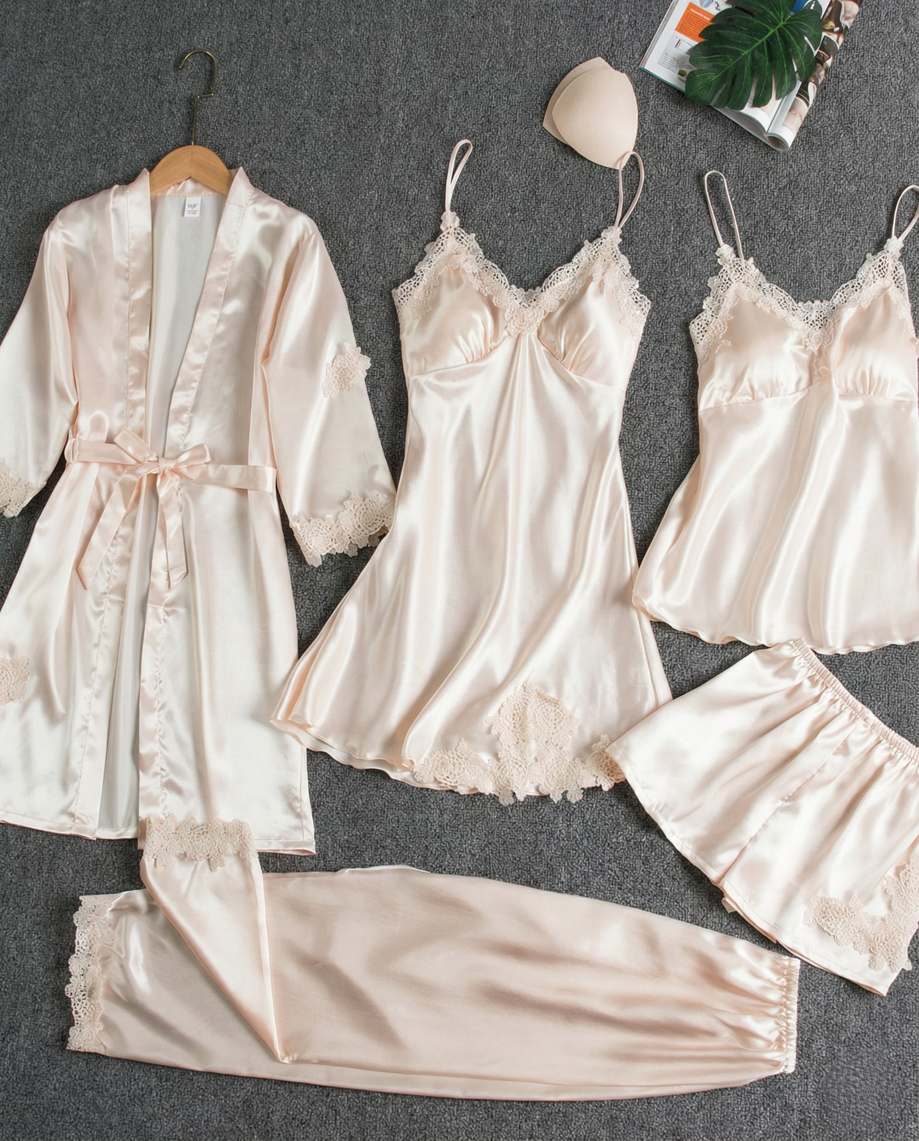 Woman wearing a soft, silky Silk-Touch Halter Pajama Set with adjustable halter neckline lounging at home