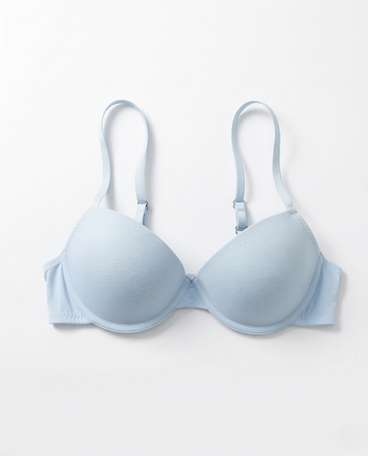 Smooth underwire bra with seamless cups, lightweight support, and adjustable straps enhancing natural feminine curves