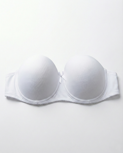 Black strapless push-up bra with seamless design and underwire support for bold lift and enhanced cleavage